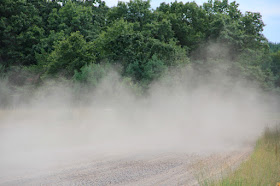 by the roadside, left in the dust 