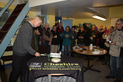 Cheshire Wildlife Trust Vice-Chair Charles Neame about to cut the cake