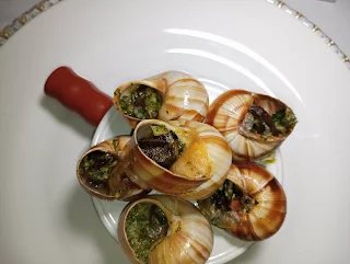 "snails or escargot from Courtyard by Marriott Paramaribo"