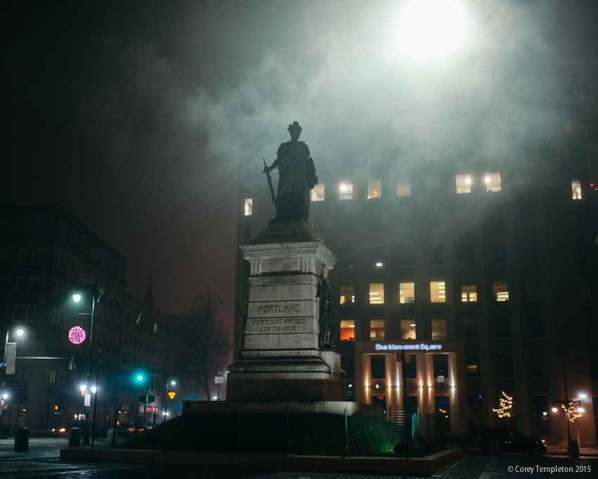 Portland, Maine December 2015 photo by Corey Templeton. The recent low-hanging fog surrounding the city makes for some interesting photo opportunities. Here is the "Our Lady of Victories" statue in Monument Square last night.