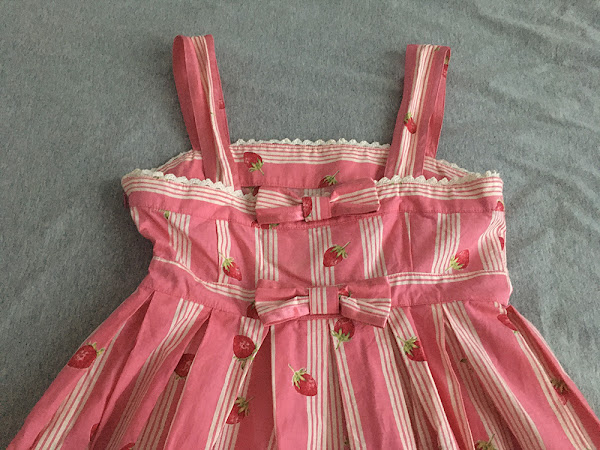 back of the dress, with two ribbons