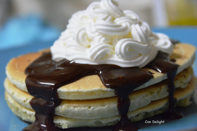 pancake tower with cream and chocolate