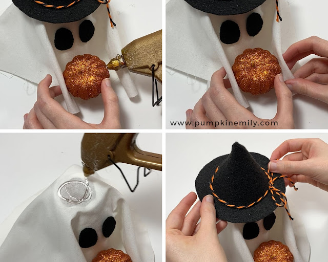 Gluing on a witch hat and a pumpkin to a ghost.