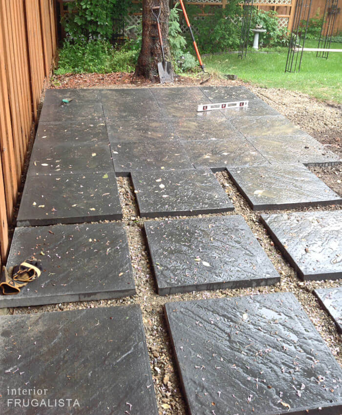 Do-it-yourself paver patio with 4-inch grid space between pavers.