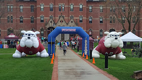 set up for the Dean Dash 5K on the Dean campus in a prior year