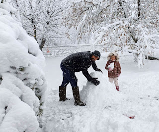 Happy playing together in the snow