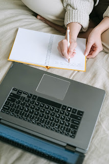 Taking notes from a computer.