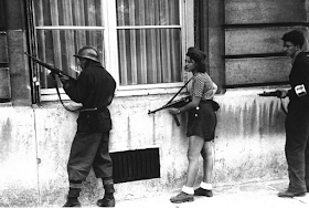 18 year old French Résistance fighter, Simone Segouin, patrolling Paris, 1944