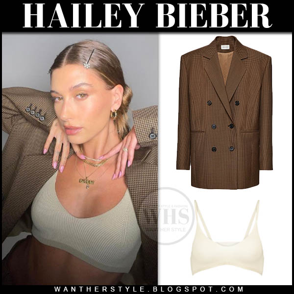 Hailey Bieber in brown blazer and beige crop top