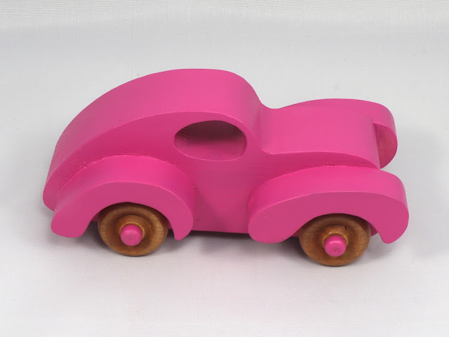 Handmade Wooden Toy Car Finised With Hot Pink Acrylic Paint and Amber Shellac, Fat Fendered Ford Torpedo