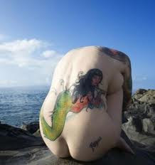 Beauty and Glamor Lower Back Tattoo
