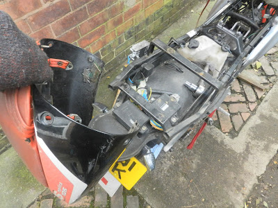 Aprilia RS 125 side and rear seat fairing  panel removal to access CDI , PV controller , Indicator relay & regulator rectifier