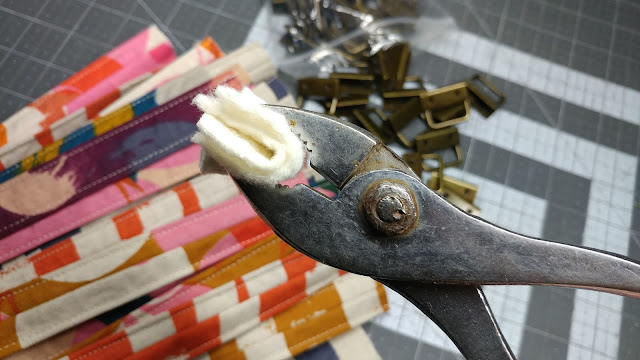 Using pliers to make key fobs