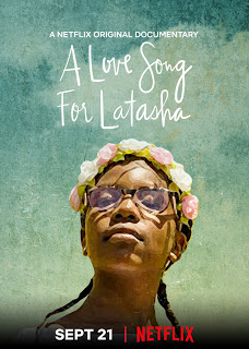 A young girl wearing a flower crown has her eyes closed. The text reads 'A Netflix original documentary' 'A Love Song For Latasha' 'September 21st' 'Netflix'
