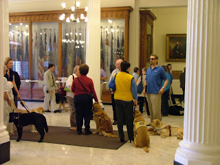PHOTO #2 OF OUR GROUP WAITING IN THE HALL OF FLAGS