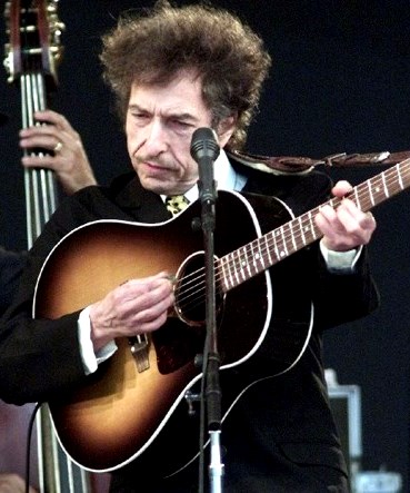 Foto de Bob Dylan tocando su guitarra