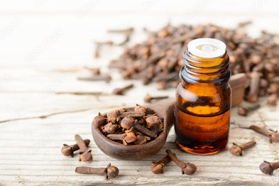 Clove Essential Oil : Benefits , Side Effects ,How to Make at Home & Precautions