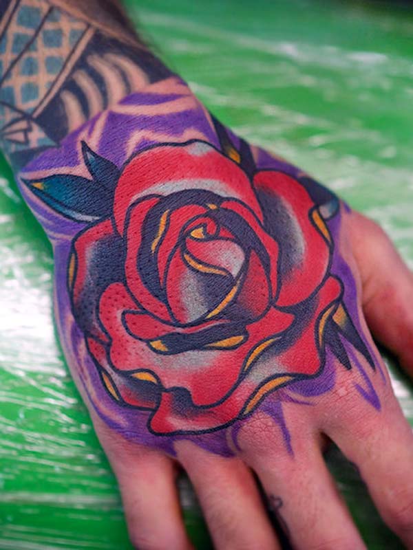 Stunning watercolor rose flower tattoo design on the hand for men