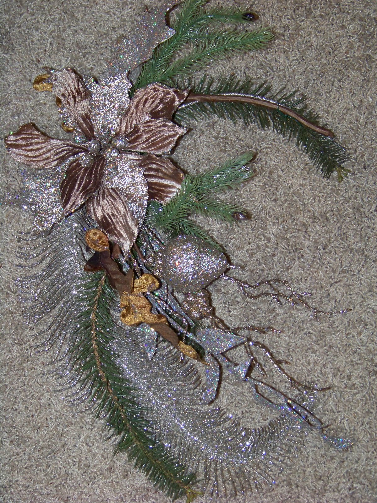 also use one long silver glittery fern leaf. title=