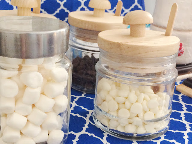 Keep warm this winter with a hot chocolate bar that will be as cute as it is helpful. With just a few items you may already have, you can make a super cute Snowman Hot Chocolate bar that will keep you warm when it's cold outside with a warm cup of cheer.