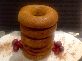 a stack of gluten free eggnog doughnuts