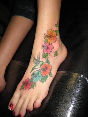 Flowers Tattoo With Hummingbird Tattoo