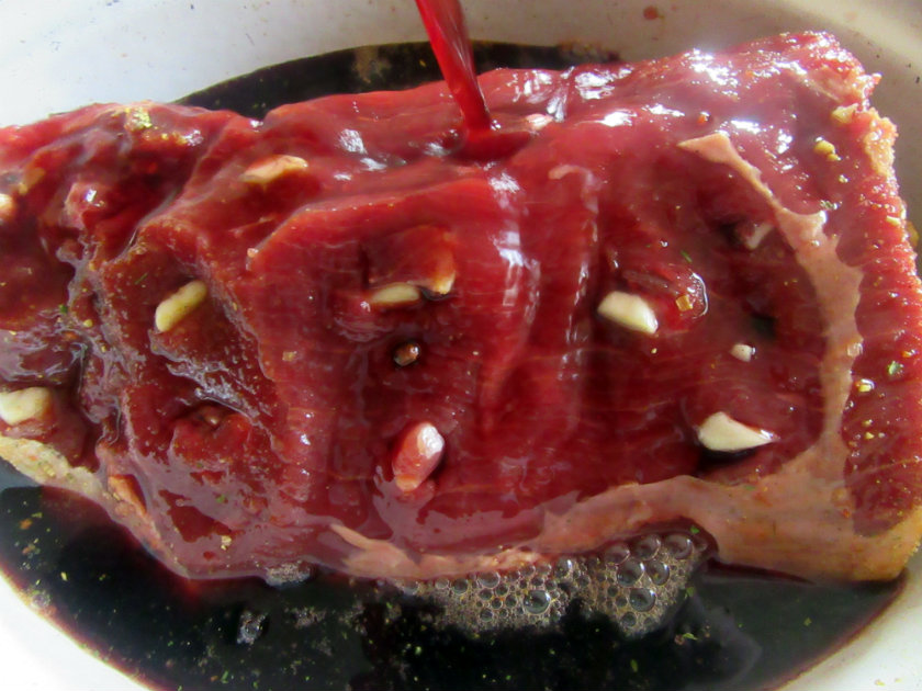 put meat into wine marinade