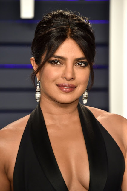 Bollywood sensation Priyanka Chopra exudes hotness in a stunning image, setting the screen on fire with her charisma and style.