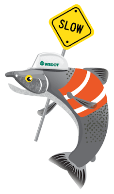 Salmon wearing orange vest and holding yellow construction sign with the word slow.