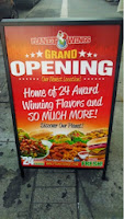 Planet Wings Grand Opening Sign