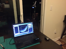 laptop connected to camera with usb moon photo