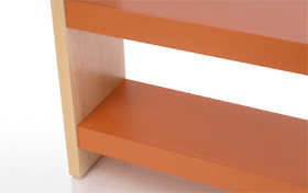 shelving with orange lacquer shelves