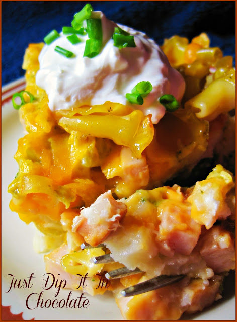 Easy Pierogi Turkey Casserole Recipe! a touch of Polish comfort food! Buttery potatoes layered with smoked turkey, cheesy broccoli and yes...more cheese! Just dig in and enjoy!