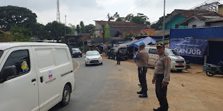 Kabid Humas Polda Jabar : Polri Lakukan Gatur Lalu Lintas Di Kampung Yang Terdampak Gempa Cianjur