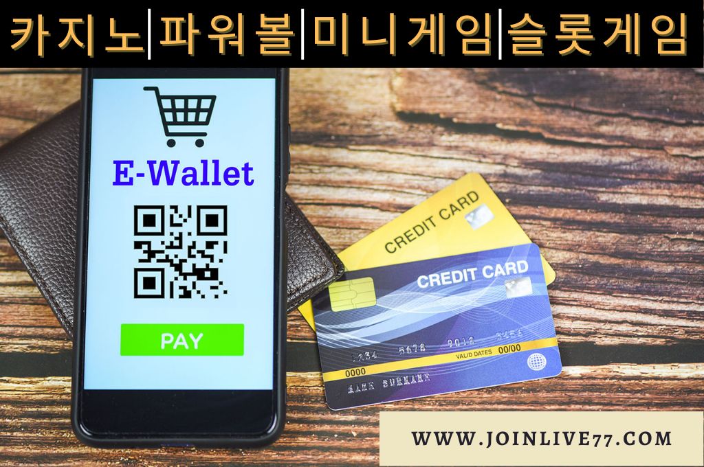 Wallet and mobile phone for e-wallet in the table with two credit cards