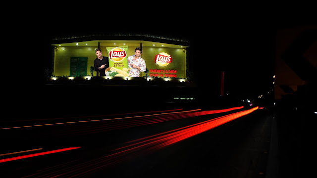 News Lays Chip in Town Messi & Akram Outdoor Campaign - Core Media 