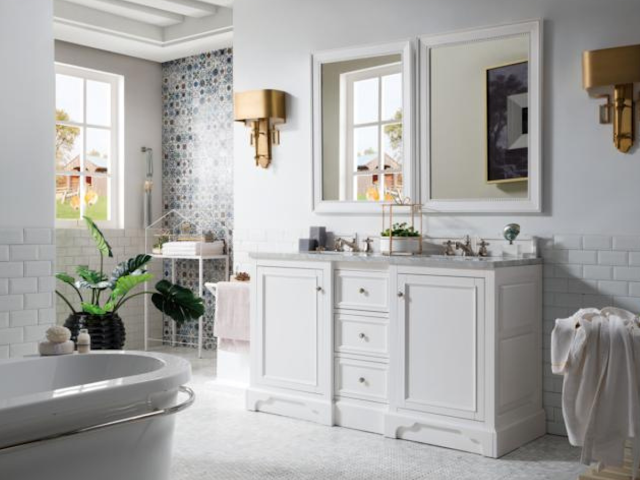Large white and gray bathroom with double vanity by James Martin.