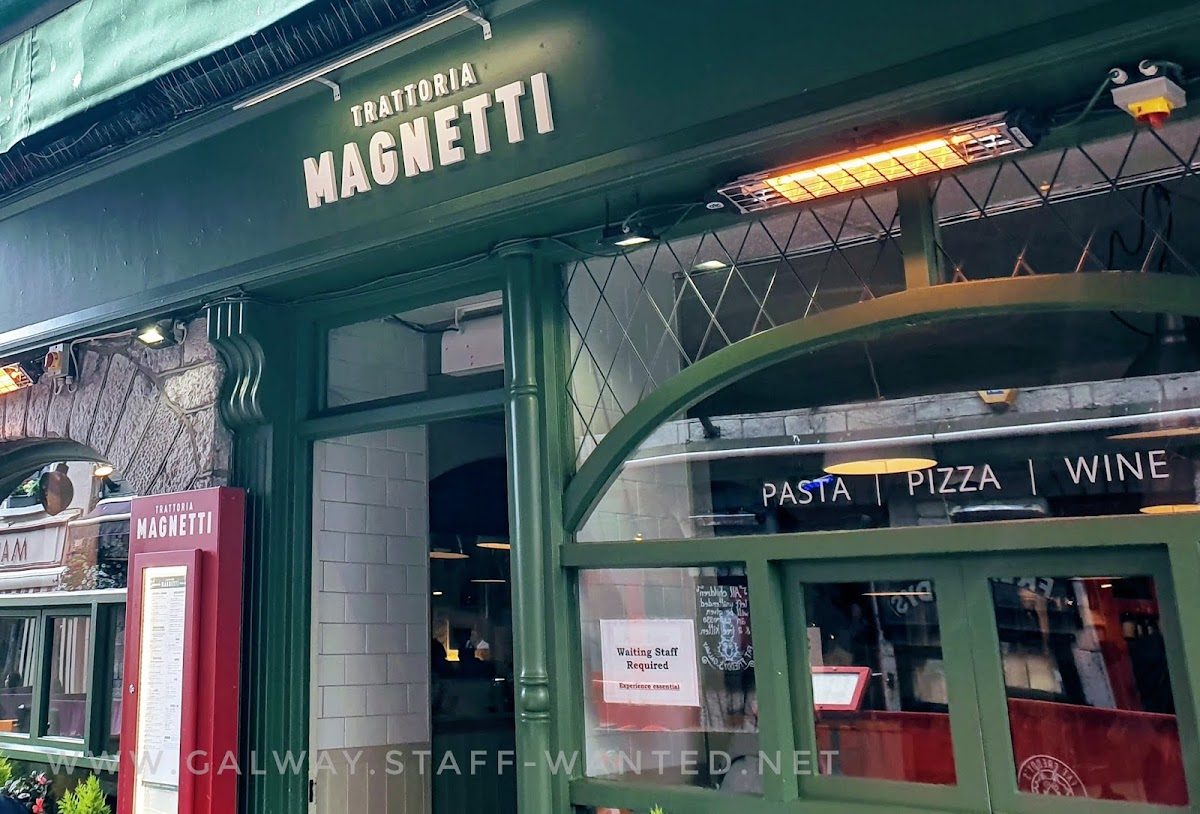 Galway city restaurant outdoor area, with a heater warming the air in July.