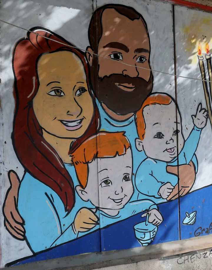 A mural depicting the Bibas family in Tel Aviv. Photo: Jack Guez/AFP via Getty