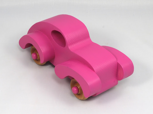 Handmade Wooden Toy Car Finised With Hot Pink Acrylic Paint and Amber Shellac, Fat Fendered Ford Torpedo
