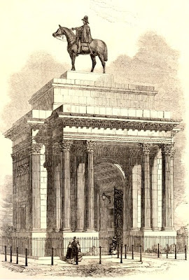 The Triumphal Arch near Hyde Park with large  equestrian statue of the Duke of Wellington on top  Wood engraving, prob by WJ Linton,  from Illustrated London News 21 November 1846  © The Trustees of the British Museum