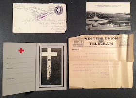 A collection of papers including a telegram and an envelope.