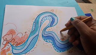 What is Expressive typography? Letter R drawn artistically like a river in blue colour.