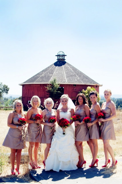 bridesmaids with red bouquets