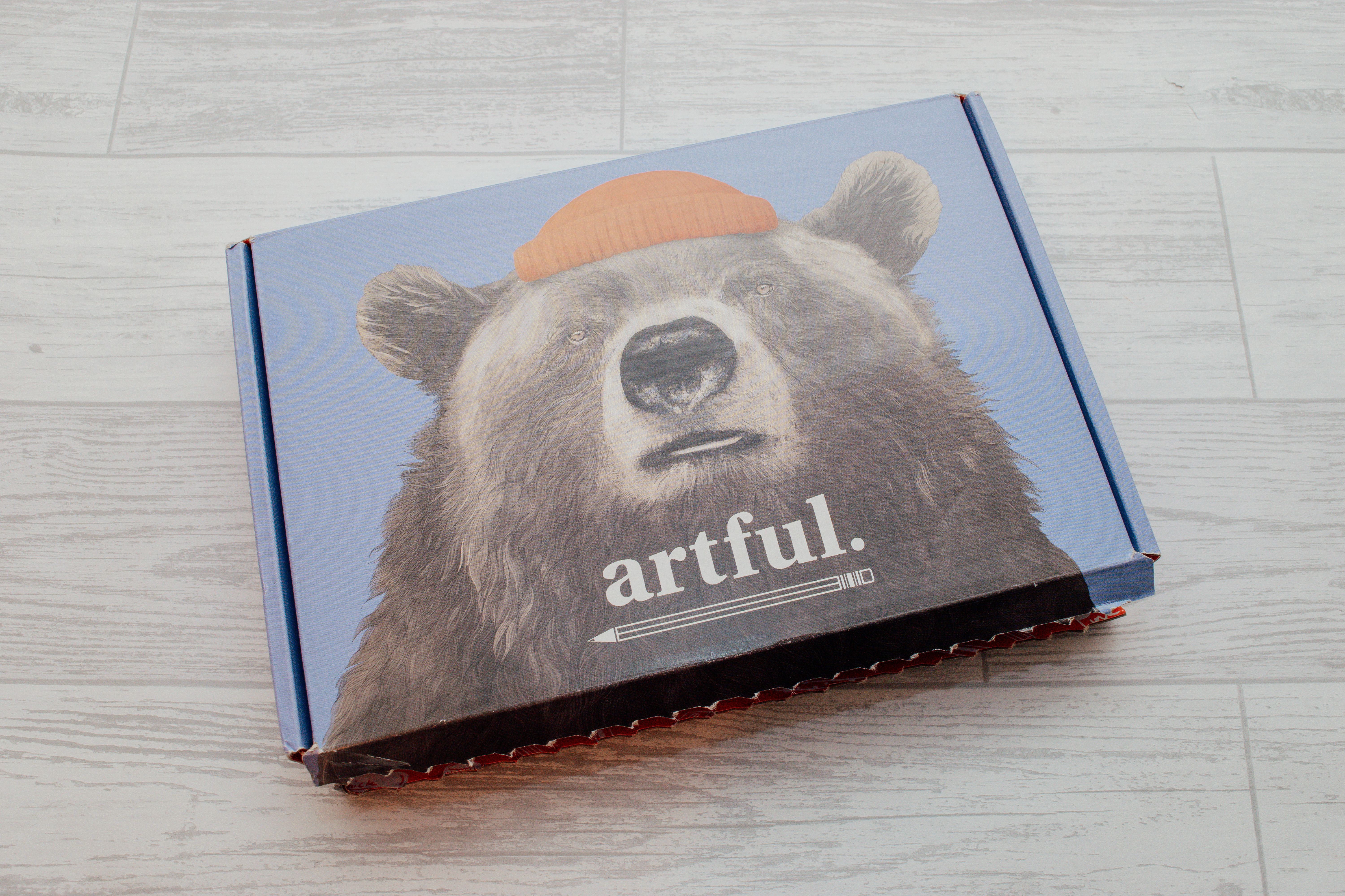 Blue box with a brown bear on the front