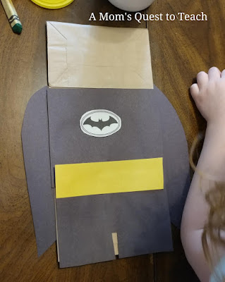 Batman paper bag puppet with all pieces but mask attached