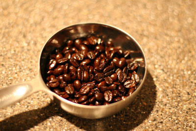 put coffee beans in clean coffee grinder and grind