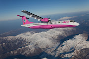 pink airplane that will fly for Azul, a budget airline in Brazil, . (azul pink airplane )