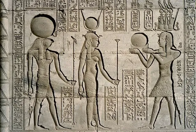 Relief at Dendera Temple showing Traianus (right), Horus (left), and Hathor (center), Dendera, Egypt