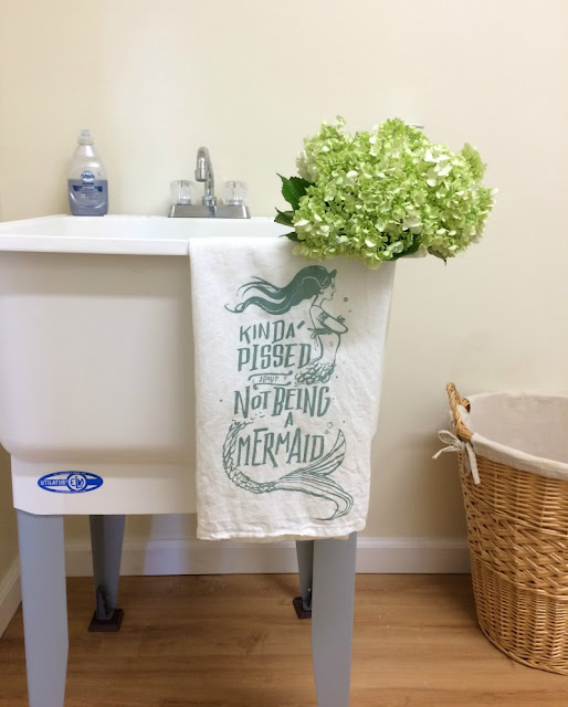 You do not have to spend a fortune to have a beautiful laundry room. Get my tips for how we built a laundry room from scratch on a budget.